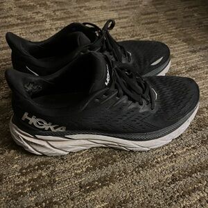 Hoka One One women’s Black and white Athletic Shoes